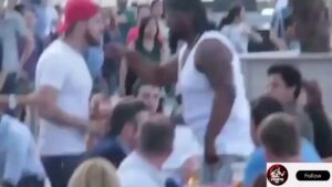 BLACK BULLY HARASSES A WHITE MAN'S WIFE AND GETS KNOCKED OUT❗